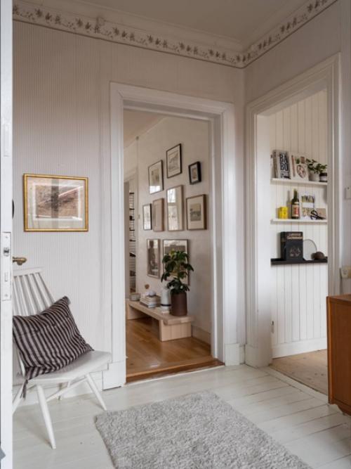 Светлая квартира с винтажной мебелью и библиотекой в центре венерсборга, Швеция. 06