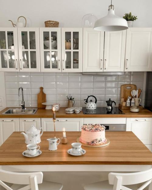 Белые кухни совершенно не надоедают с годами! 05