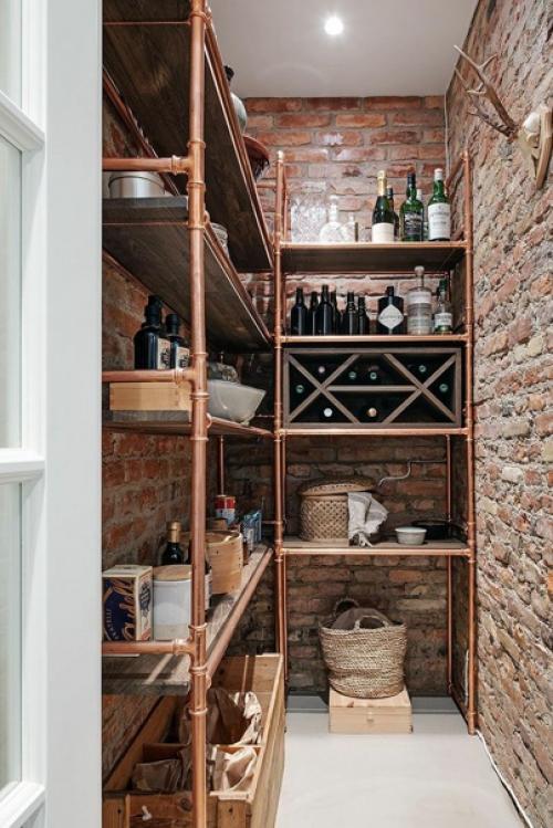 Кухня с открытой кирпичной стеной и элегантная гостиная: квартира в Гётеборге (82 кв. 05