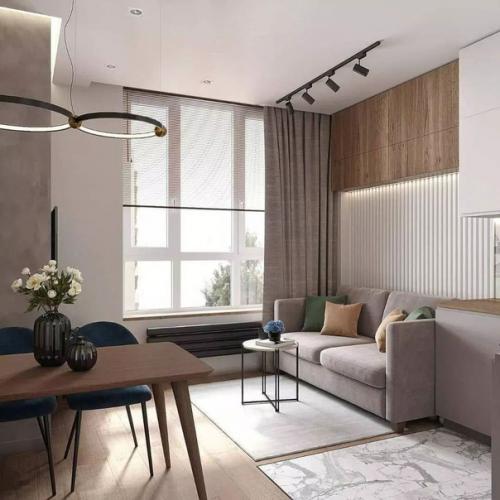 Лаконичная стильная уютная, вот что приходит на ум, когда смотрю на фото интерьера этой кухни - гостиной. 03