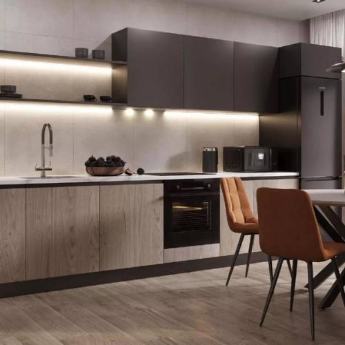 За счет сочетания тёмных и светлых тонов интерьер кухни - гостиной площадью 25 м получился очень выразительным и контрастным. 02