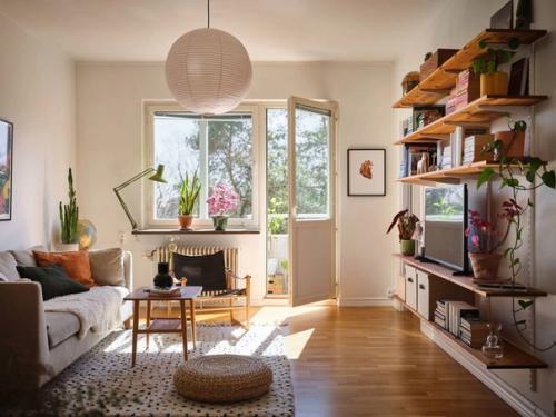 Небольшая квартира с приятными зелеными и деревянными акцентами. 09