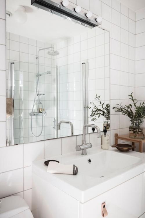 Скандинавская квартира с изразцовой печью и приятным интерьером в стиле Kinfolk. 08