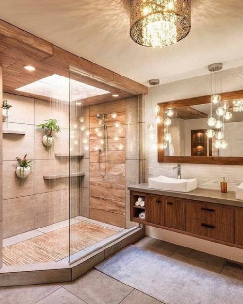 Правильно оформленный дизайн душевой кабины позволяет избежать разлетающихся по комнате брызг и исключает падения из-за скользкого дна. 03