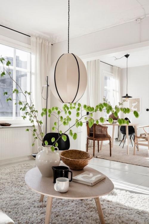 Скандинавская квартира с изразцовой печью и приятным интерьером в стиле Kinfolk. 01