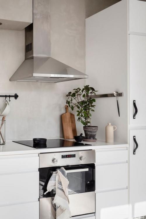 Скандинавская квартира с изразцовой печью и приятным интерьером в стиле Kinfolk. 03