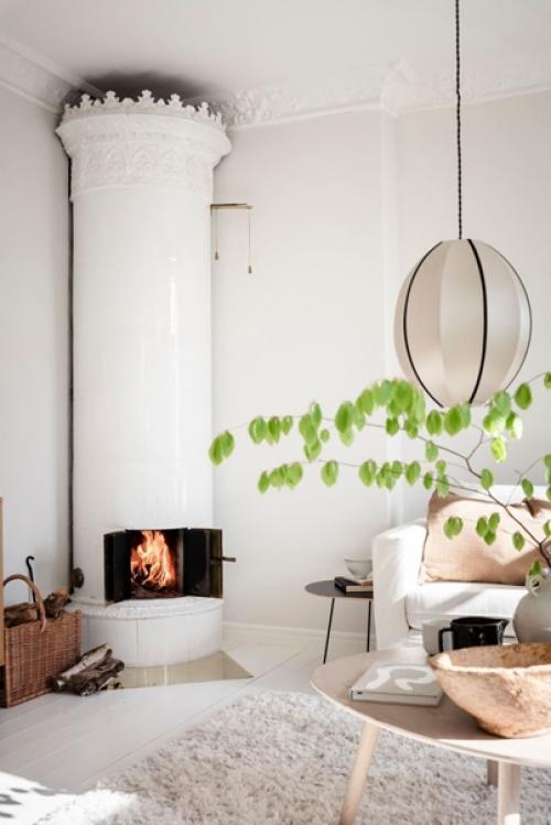 Скандинавская квартира с изразцовой печью и приятным интерьером в стиле Kinfolk. 07