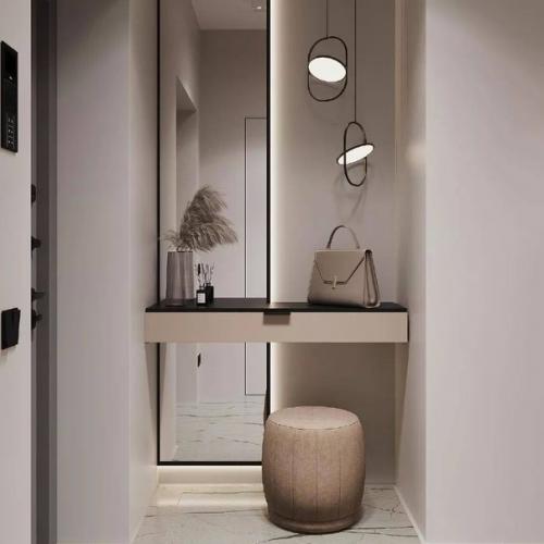 За счет сочетания тёмных и светлых тонов интерьер кухни - гостиной площадью 25 м получился очень выразительным и контрастным. 09