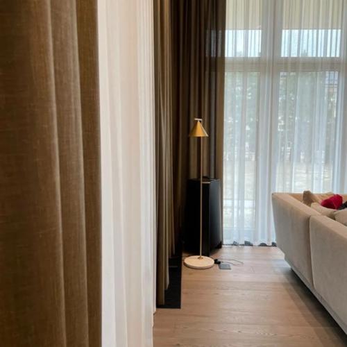 Полупрозрачная портьера в загородном доме заказчика. 02