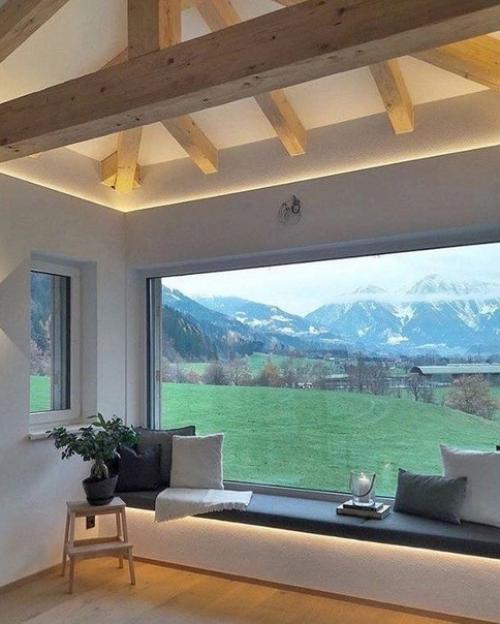 Расширить функциональность комнаты можно с помощью мягкого подоконника, который превращают в диван. 05