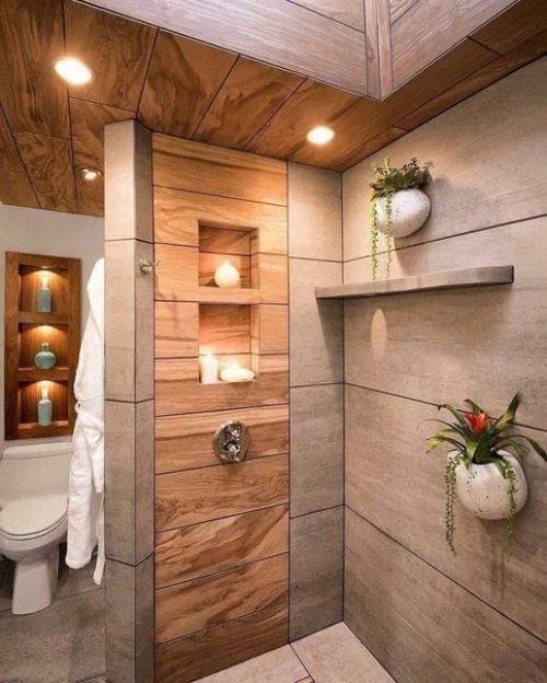 Правильно оформленный дизайн душевой кабины позволяет избежать разлетающихся по комнате брызг и исключает падения из-за скользкого дна. 02