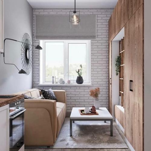 Стильный и простой интерьер квартиры - студии площадью 22 м с элементами лофта. 01