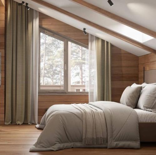 Пастельные оттенки бежевого в сочетании с деревянными элементами, отсутствие ярких акцентов, умеренность декора, продуманное освещение. 01