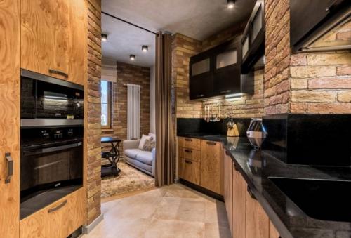 Лофт - интерьер кухни - гостиной нестандартной формы. 05