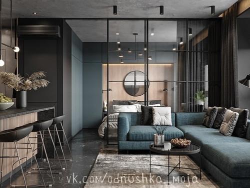 Интерьер однокомнатной квартиры в стиле лофт с имитацией бетонных поверхностей. 03