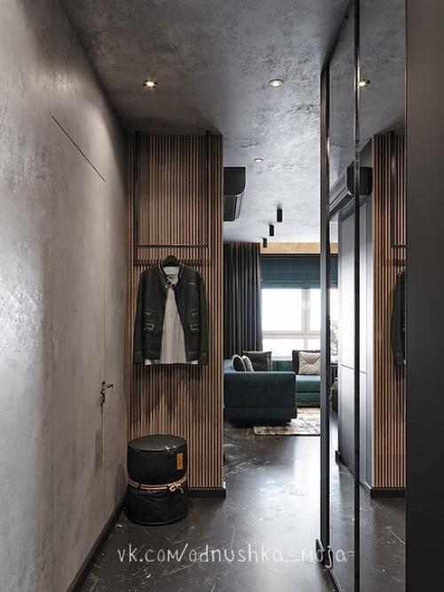 Интерьер однокомнатной квартиры в стиле лофт с имитацией бетонных поверхностей. 07