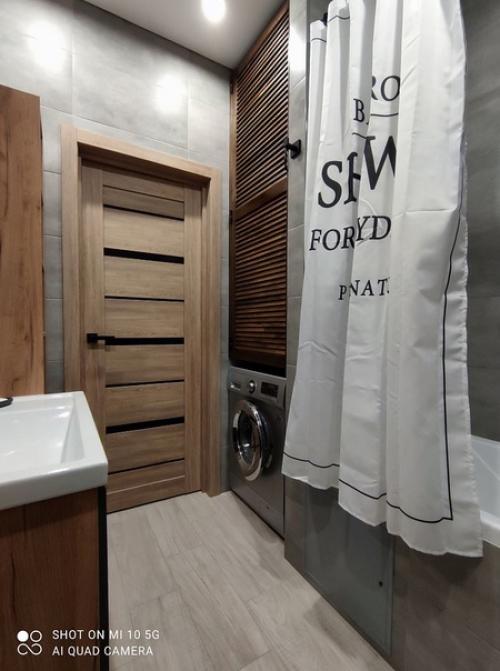 Современный интерьер совмещенного санузла в квартире молодого холостяка. 07