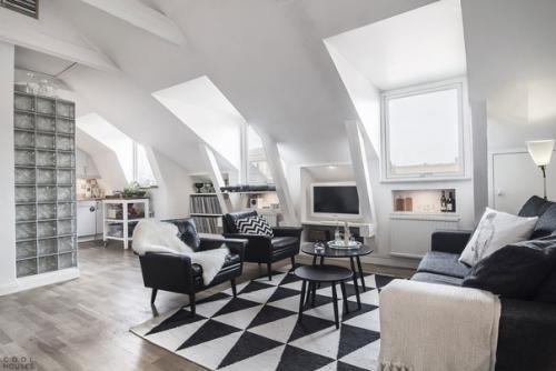 Современная мансардная квартира в скандинавском стиле расположена в Стокгольме, Швеция. 03