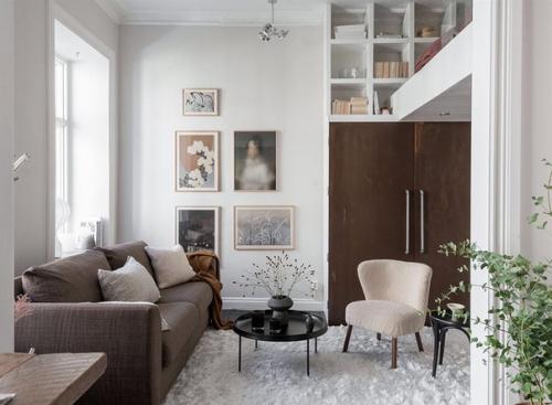 Кирпич, грубое дерево и спальня на антресоли: интересная небольшая квартира в Швеции (35 кв. 02