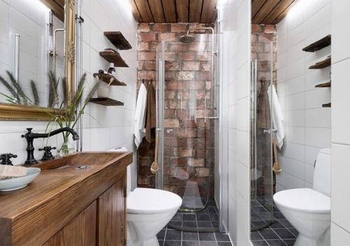 Кирпич, грубое дерево и спальня на антресоли: интересная небольшая квартира в Швеции (35 кв. 09