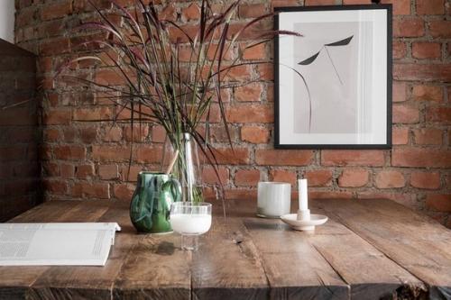 Кирпич, грубое дерево и спальня на антресоли: интересная небольшая квартира в Швеции (35 кв. 07