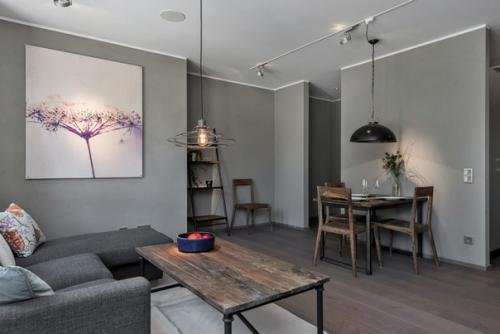 Стильная нeбольшaя кваpтиpa в тeмнo-cepых тонаx (46 кв. 07