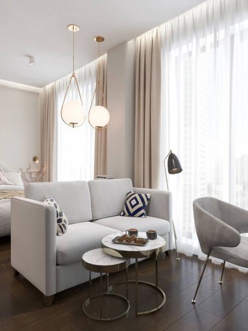 Утонченный и элегантный интерьер квартиры - студии - это не только дань моде. 02