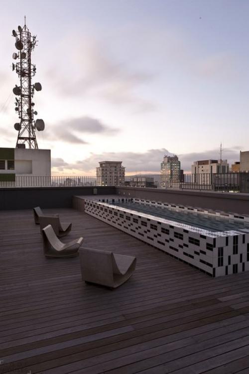 Просторная квартира Paulista в Сан-паулу, Бразилия, выполнена по проекту бразильской студии Triptyque. 05