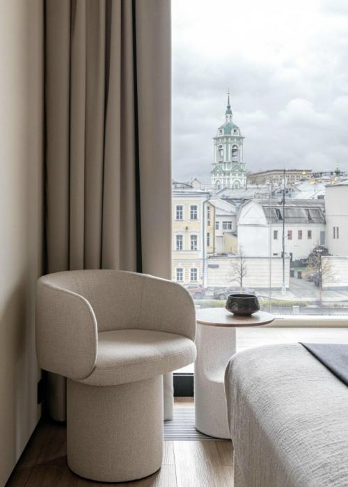 Современные апартаменты рядом с кремлём - пример того, как минимализм может быть уютным и функциональным. 03