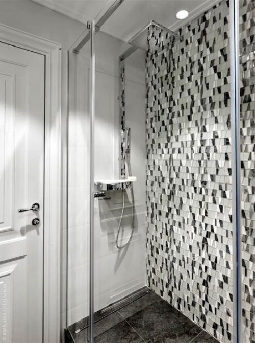 Лаконичный интерьер в стиле минимализм, в котором присутствуют характерные детали: яркие акценты и необычные изделия из металла и стекла. 07