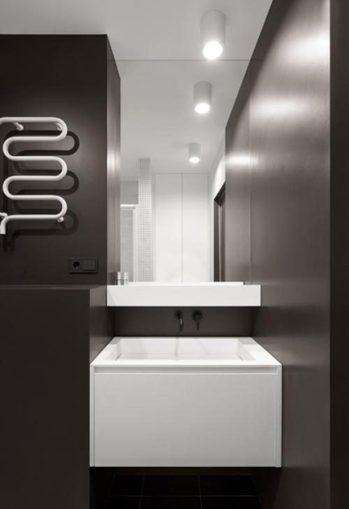 Темный минималистичный интерьер квартиры 40 кв. 08