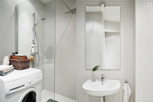 Изысканный монохромный интерьер в Гетеборге (74 кв. 06