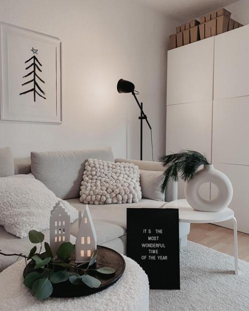 В дизайне интерьера скандинавские гостиные приобрели огромную популярность благодаря своей вневременной привлекательности и уютному очарованию. 05