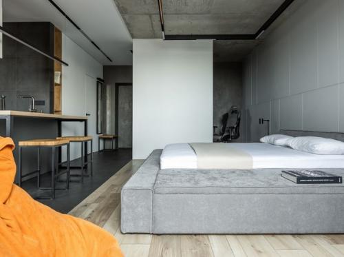 Современный брутальный интерьер квартиры - студии для молодого, креативного холостяка. 04