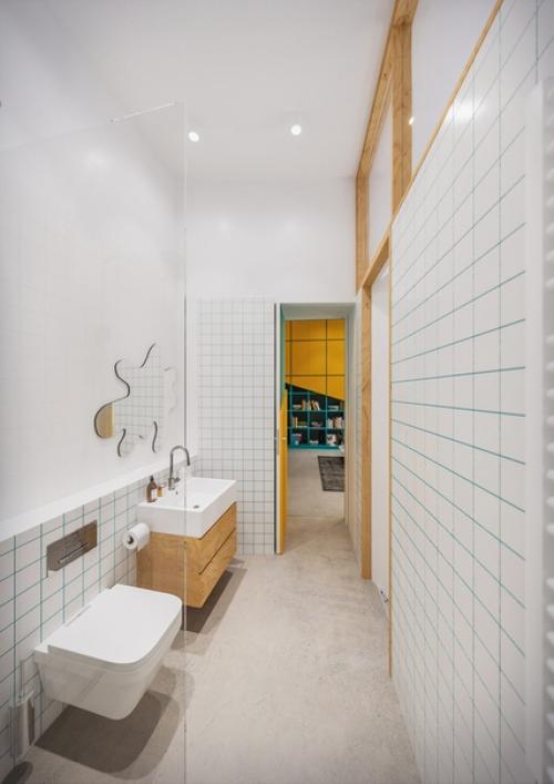 Функциональный интерьер квартиры с ярким акцентом в мебели. 06