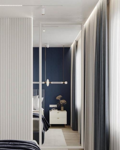 Спальня с санузлом из дизайн - проекта, где акцентом выступает благородный синий оттенок. 05