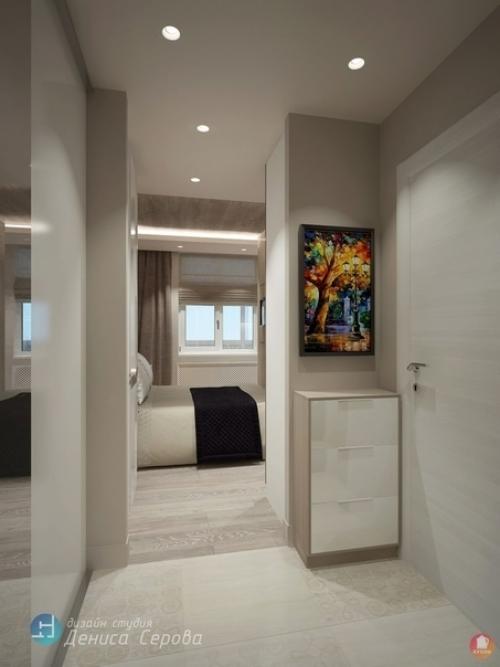 Маленькая студия с длинным узким балконом, необычным оформлением спальника и идеальной эргономикой. 07