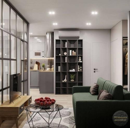 Одно из самых лучших цветовых сочетаний в дизайне интерьера квартиры: серая гамма, разбавленная приятными зелёными оттенками. 01