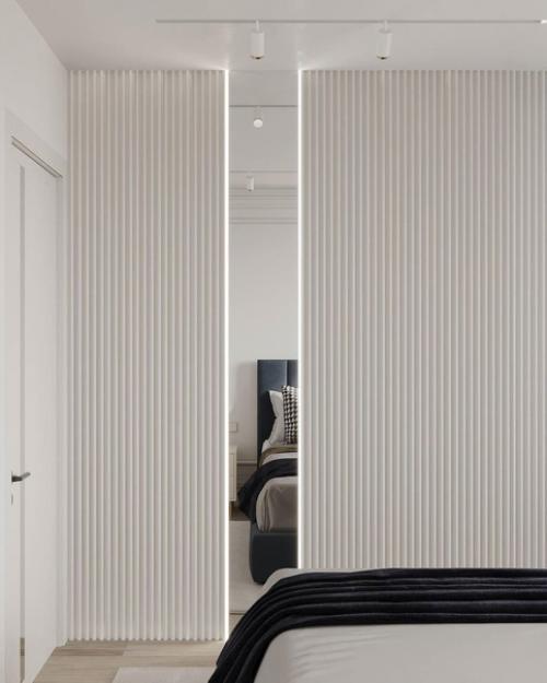 Спальня с санузлом из дизайн - проекта, где акцентом выступает благородный синий оттенок. 04