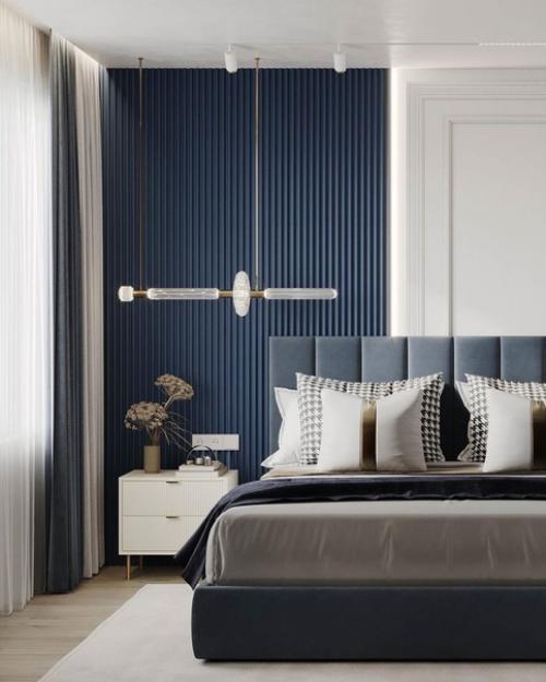 Спальня с санузлом из дизайн - проекта, где акцентом выступает благородный синий оттенок. 02