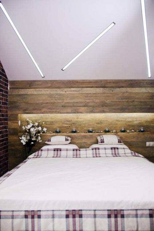 Интерьер спальни на мансарде в стиле лофт. 03