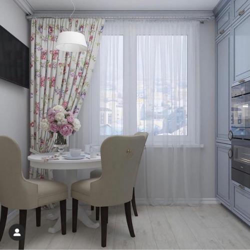 Угловая кухня с круглым обеденным столом. 02