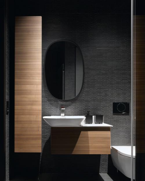 Обволакивающий, уютный интерьер дизайнеры Валерия Маслова и Пётр Маслов создали для молодых супругов, которые любят чёрный цвет. 07