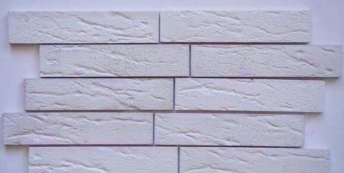 Гипсовая плитка евролит Романский Кирпич, выполненная в белом цвете или под покраску, имитирует старинную кирпичную кладку. 01