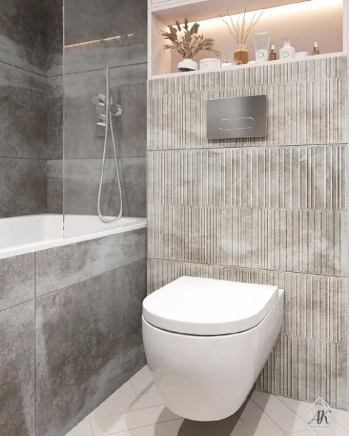 Чтобы создать неповторимый дизайн ванной порой достаточно использовать в отделке комнаты не одну модель и размер плитки, а несколько. 04