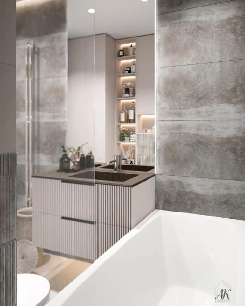 Чтобы создать неповторимый дизайн ванной порой достаточно использовать в отделке комнаты не одну модель и размер плитки, а несколько. 02