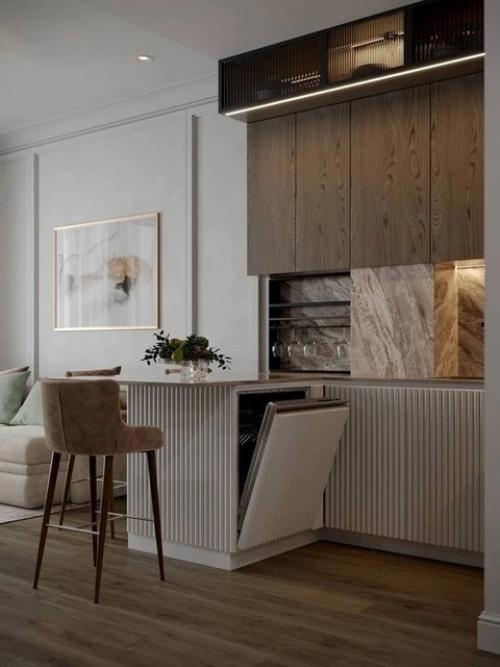 Красивый и элегантный бежевый интерьер кухни - гостиной создаёт тёплую и уютную атмосферу. 01