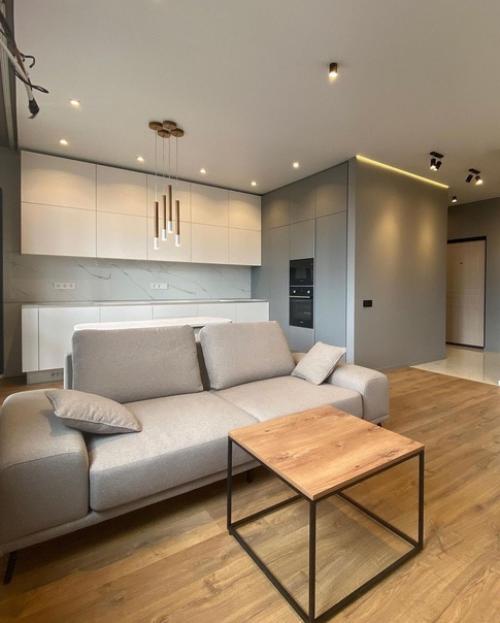 Сделали перепланировку и теперь у нас большая кухня - гостиная где очень много места. 01