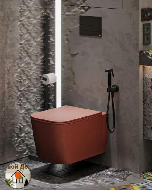 Брутальный интерьер ванной, сочетающий грубые фактуры металла и бетона с нотками изящности в виде орнаментов. 06