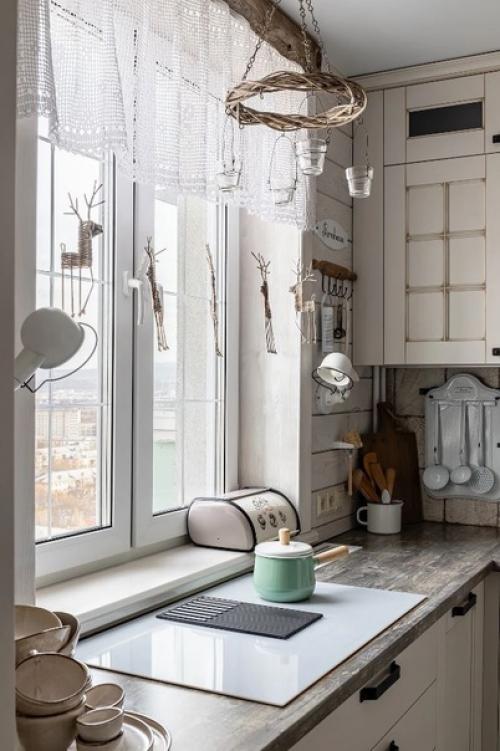 Атмосферный интерьер кухни - гостиной в квартира, которая выглядит, как загородный дом. 03